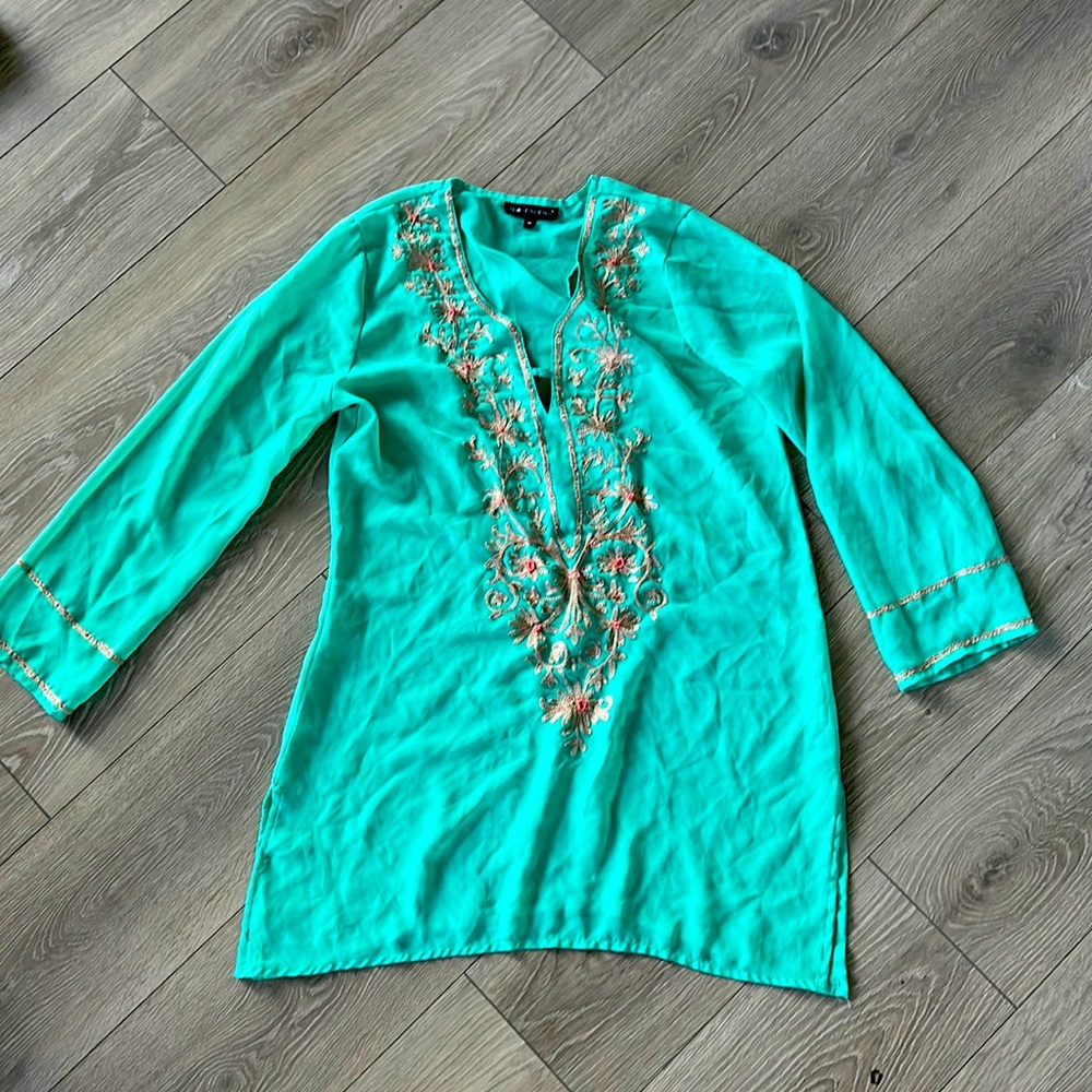 Size medium sheer beach cover up. Never warm. Bright vibrant color